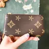 Med Box Brown Check Flower Rosalie Victorine Wallet Designer Plånböcker Purse präglad Key Pouch Cardholder Womens Man Luxury Leather Coin Purse Card Holder Keychain