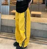 Pantalon Femme Coréen Y2K Streetwear Yellow Track Femmes Harajuku Hip Hop Pantalon de survêtement à jambe large surdimensionné Pantalon de jogging à rayures à séchage rapide