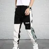 Pantaloni da uomo streetwear classico casual da uomo nastri da jogging pantaloni da donna multitasche cargo slim fit primaverili