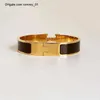 Gioielli di moda da uomo e bracciali da donna Classici Arancione Bracciale rigido dal design di alta qualità in acciaio inossidabile con fibbia in oro