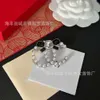 24SS Designer Channel Xiaoxiangfeng 2023 Ny kändisstil Silverbrev Bow Halsband örhänge Set Internet röda örhängen