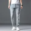 Rippad för män hiphop jeans smala mager fit stretch ljusblå lapptäcke modellerande manliga denim byxor s kläder