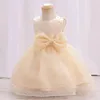 女の子のドレス2023ベビードレスノースリーブ弓TUTUのためのバプテスマ1年生の誕生日パーティー幼児服