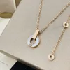 2024 Designer Bulgaria Baojia Round Cake Coin Titanium Steel Inlaid Ceramic Necklace Women's Full Diamond Rose Gold Fashion Pendant Net Red Collar Chain