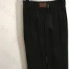 Swobodne spodnie z szerokości nóg kobiety elastyczne talia luźne proste spodnie projektant marka zamek błyskawiczne litera drukuj spodnie dresowe