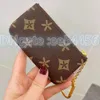 M62650 Womens Genuine Leather key coin purse mens wallet black flower poke card holder keychain luxury Designer small zippy wallets Coin Purses CardHolder Key pouch