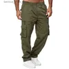 Męskie spodnie Nowe mężczyźni Spodnie ładunkowe Summer Button Elastyczne talia luźne spodnie luźne spodnie multi-kieszeni sporty sporty na zewnątrz noszenie Q231201
