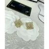 24SS Designer Channel 23 Nouveau matériau en laiton Xiangjia Petit parfum exquis incrusté de diamant d'eau Matériau en laiton Boucles d'oreilles de luxe légères de haute qualité