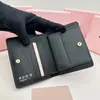 Kadın yay cüzdanı kısa orijinal deri cüzdanlar öğrenci kız kalp sevimli iki kat para klip kart çantası ince taşınabilir çok yönlü csd2312015-12