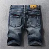 Jeans da uomo Stilista estivo Uomo Retro Nero Blu Ricamo elastico Strappato Corto Homme Pantaloncini di jeans casual vintage