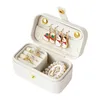 Boîtes à bijoux CrossBorder Portable Mini boîte rouge à lèvres voyage boucles d'oreilles bague petit 231201