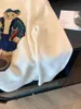 女子セーターアカデミースタイルの漫画テディベア刺繍ラウンドネックニットセーター2023年秋の新しいゆるく汎用性の高いスリミングカジュアルセーター