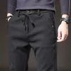 Men's Pants MINGYU Brand Autumn Winter Brushed Fabric Casual Men Thick Business Work Slim Cotton Black Grey Trousers Male Plus Size 38 231201