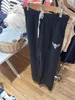 Pantaloni da donna con stampa teschio a gamba larga da donna casual elasticizzati a vita alta in cotone dritto Y2K Streetwear pantaloni con lacci