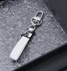 Zinklegering läder bilnyckelring Vachette CLASP Creative Simple Keychain Pendant Cars Ornament i Stock Partihandel