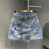 Saias y2k vintage mulheres coreano graffiti azul casual curto denim mini estético grunge cintura alta jeans uma linha saia alt roupas 231201