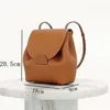 Sac en cuir véritable de haute qualité, sac à dos décontracté pour femmes, sac sous les bras, sac à bandoulière de voyage à la mode, sac en cuir de vache à grain de litchi, porte-monnaie à changement