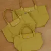 Projektantka damska torba na ramię w stylu europejskim dumpling nylon torebka crossbody składana haftowa torba crossbody torba na zakupy trzy rozmiary