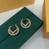 2022 Diseñador Pendientes de plata para mujeres Colgante verde Aro Pendiente de perlas Diseñadores de lujo F Pendientes de perno de letra D2201262Z253R