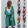 Kvinnors tröjor långa kofta fast färg europeiska och amerikanska stickade modeströja ytterkläder kvinnlig 231201