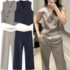 Pantaloni da donna Pantaloni a vita asimmetrica femminile 2023 Moda autunno Misto lana Lungo da donna Tasche a filetto a gamba larga per ufficio quotidiano