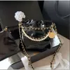 Bolsos de diseñador Mini basura Cadena de perlas Hombro Bolso de cuero Bolso de moda Monedero Cartera Sandalia Zapatos Tote