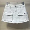 Gonne Designer Alta qualità Miao Nuovo stile di lavoro Tasca Gonna di jeans Pantaloni Instagram Street Dimagrante Versatile Hot A-line Moda Lhhj