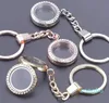 Keychains 1 st runda glas flytande relikario Keychain Rhinestone Living Memory Locket Key Chain for Women Men DIY Birthday Jewelry Gift
