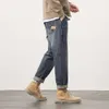 Män s jeans baggy löst fit harem byxor för kläder streetwear mode fickor lapptäcke stora byxor överdimensionerade
