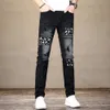 Black Men Ripped Hip Hop Stretch Slim Fit Printing Patchwork Denim Pants Streetwear Destroyed Frayed Moto And Biker Jeans