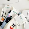 Chaussettes de femmes quatre saisons japonais vintage moyen tube de la femme en coton peigné