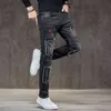 Män svart stretch rippade jeans hip hop lapptäcke smala fit denim byxor motocycle s byxor high street nödställda