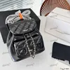 23b oljevaxläder mini ryggsäck 18 cm designer kvinnor axelväska läder diamant hårdvara metall lås lyx tote matelasse kedja crossbody purse sacoche väskor