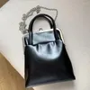 Sacs de soirée Cadre décontracté coréen pour femmes Sacs à main de luxe Designer Sacs à main 2023 en PU Clip en métal Poignée supérieure Chaîne Épaule Messenger