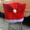 Capas de cadeira 4 pcs jantar tecido não tecido Natal volta universal chapéu de Papai Noel 25 em fontes de festa de ano