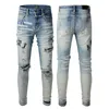 Jeans da uomo viola Jeans firmati Moda motociclisti strappati effetto consumato Denim Cargo da uomo Pantaloni neri Jeans skinny con buco rotto