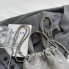 Torby szkolne 2023 Modna retro dżinsowy plecak Nitowany damski tkanina tekstury torebki projektant ramion zwykłego kwadratowego torby crossbody