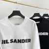 Brouillard nouveau lettre minimaliste coupe ample hommes et femmes Couple décontracté à manches longues col rond T-Shirt automne à la mode Ins