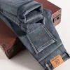 Jeans caldi in pile da uomo nuovi invernali Pantaloni da lavoro in stile classico casual vestibilità regolare addensati pantaloni in denim elasticizzato Pantaloni di marca maschile