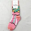 Chaussettes de créateurs Chaussettes heureuses Chaussettes mi-tube en coton pour femmes Quatre saisons avec des chaussettes de marée épaisses Chaussettes de couple respirantes de dessin animé Chaussettes de créateurs pour femmes