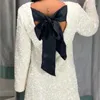カジュアルドレススパンコール女性のための白いドレス弓長い袖oネックミニ女性2023ウィンターファッションパーティークラブレディースベスティド