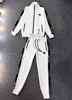 Дизайнерский спортивный костюм Женский спортивный костюм Черные женские спортивные костюмы Модный комплект из топа и брюк Куртка с длинными рукавами Брючный костюм Спортивный костюм Комплект из 2 предметов Женская одежда