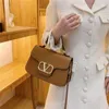 Di alta qualità 2023 nuovi designer di moda di lusso donne del nastro catena borsa a tracolla borsa in pelle tote signore copertura di vibrazione borse a tracolla diagonale portafoglio