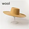 Large bord chapeaux seau laine Fedora chapeau simple panneau lumineux anneau grand bord laine haut défilé shopping 231202
