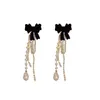 Charm Silver Needle Black Bow Pearl Tassel örhängen Fransk ljus lyxstil och premium 231202