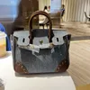 Luxury A Birkns Birkns en cuir patchwork en cuir Sac en denim pour les femmes automne et hiver 2024 Nouvelle mille chèques d'oiseau simple Sac à bandoulière UM3U