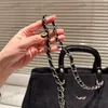 Bolso de aeropuerto Bolso de hombro para mujer de diseñador 37 cm Pana Herrajes plateados Botón de metal Top Bolso de lujo Bolso cruzado con cadena Matelasse Bolso de viaje Bolsas de compras Sacoche