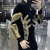 Men's Sweaters Stylish Printed O-Neck Spliced All-match Korean Sweater Men Clothing Autumn Oversized Casual Pullovers Loose Warm Tops 231201