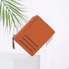 Titulaires de cartes Mode Vente Sac pour femme Simple Bourse Compact Fermeture à glissière Solide Couleur Lychee Modèle Titulaire d'affaires