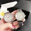 腕時計ファッションブランドのラインストーン女性の時計カジュアルスポーツクォーツマンローマ銀ブレスレットステンレス鋼の時計工場販売